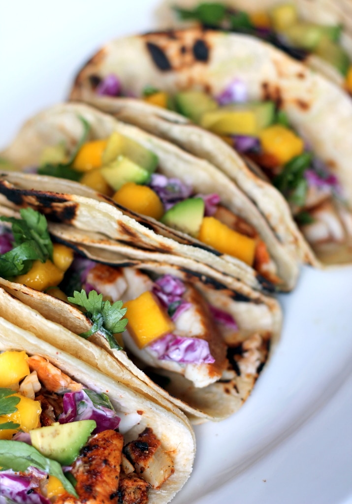 grilled chili lime fis tacos with sour cream cabbage slaw mango avocado