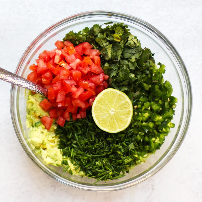 cilantro guacamole recipe ingredients in a bowl