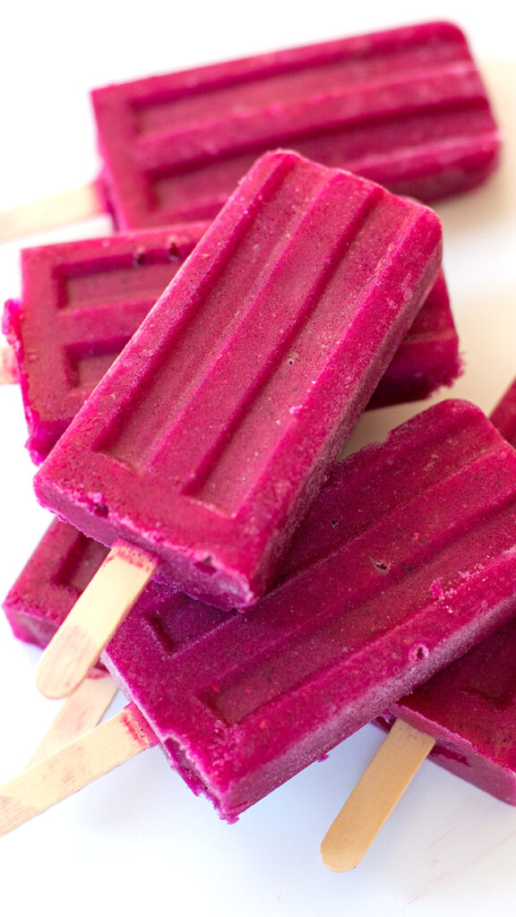 dragon fruit popsicles with raspberries